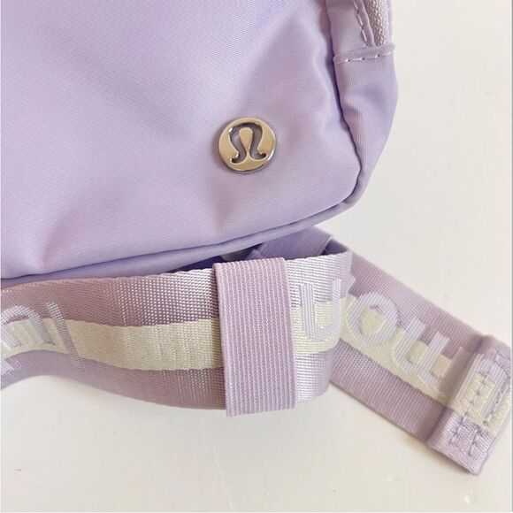 NWOT Lululemon Everywhere Belt Bag 1L
Wordmark- Lilac Ether/White Opal/White - Picture 4 of 16